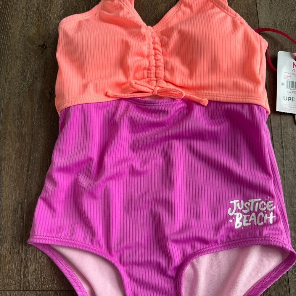 Justice Swimming Suit. One piece. Girl’s size medium (10). New with tags!